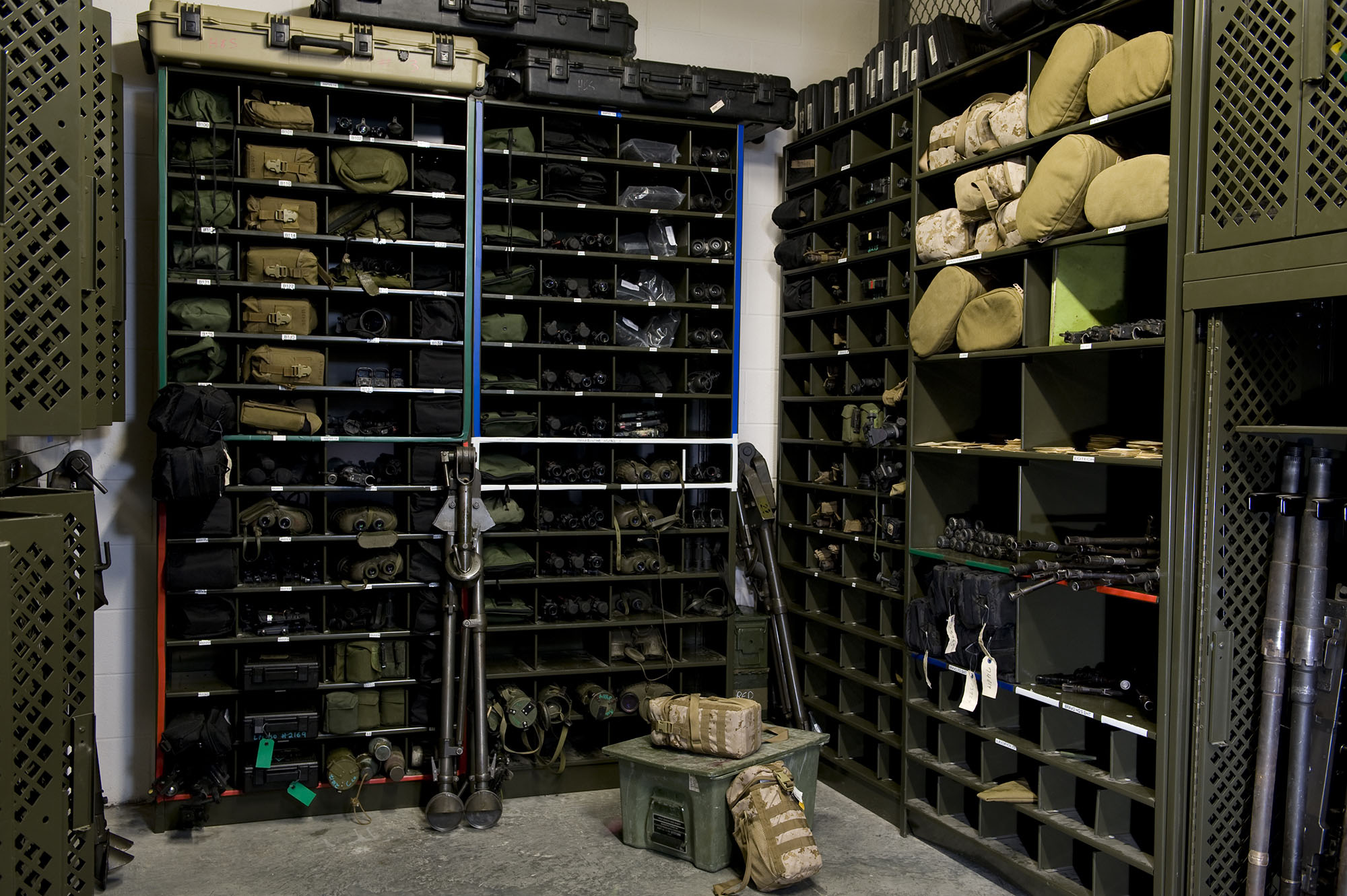 Optic and weapons storage in arms room at military base