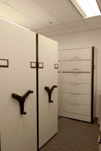 Low profile mobile shelves storing various office equipment