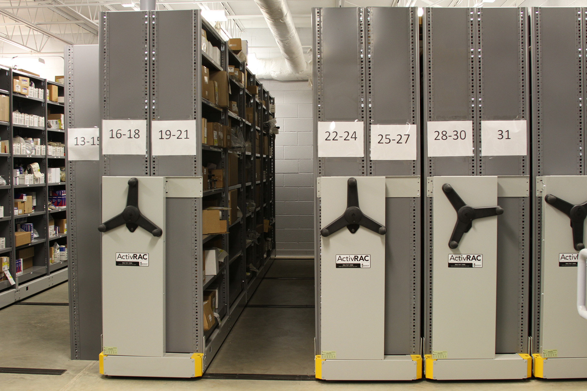 Tool room storage on mechanical-assist mobile shelving