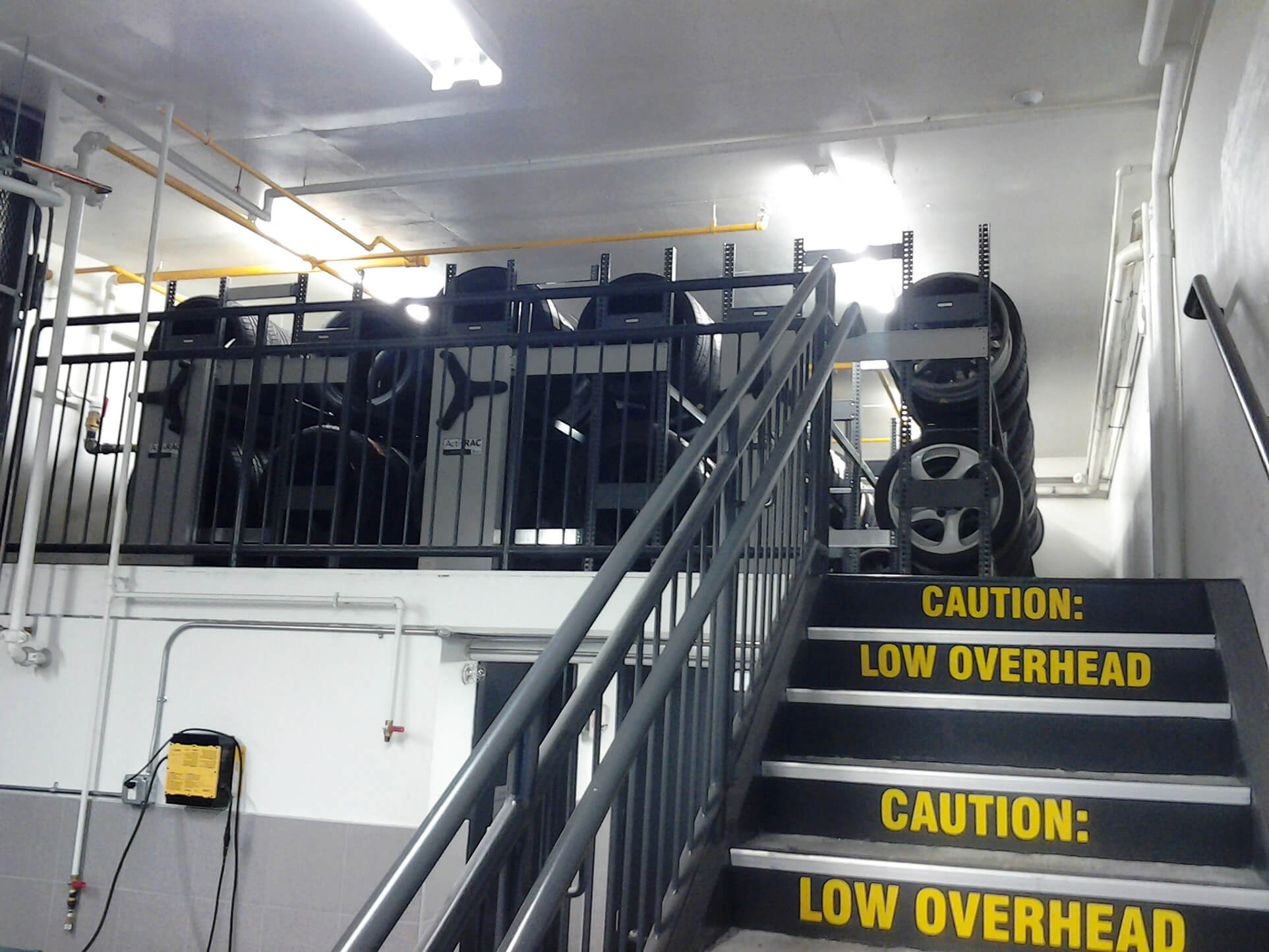 compact racking system of Tire storage up on mezzanine