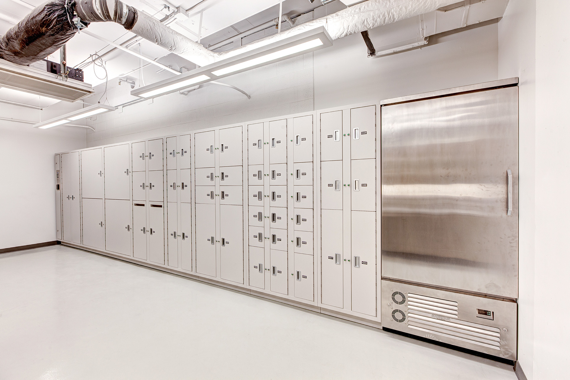 Secure evidence lockers with refrigerated section