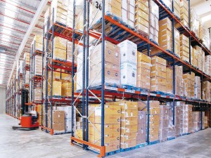 pallet racking in a warehouse storing various goods