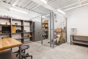 wire caging with cabinets and workbenches